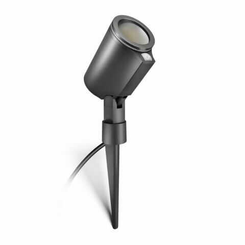 Projecteur extérieur intelligent avec piquet, boîtier noir, lumière LED directionnelle, idéal pour l'éclairage de jardin ou de façade.